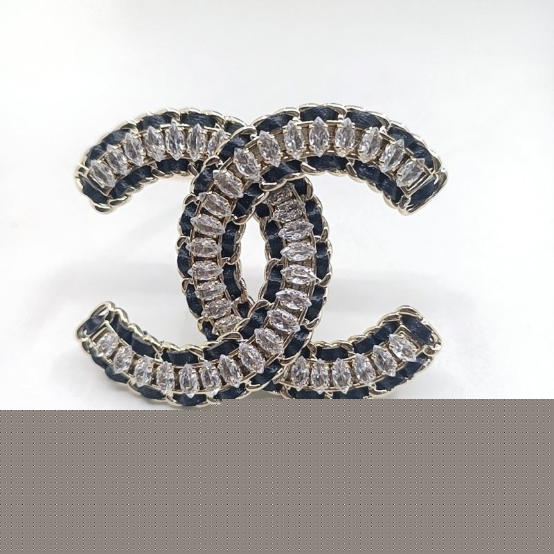 Ch*el brooches